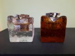 Lote com 2 isqueiros de mesa em vidro. Não testados