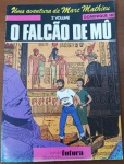 HQ Rara: Uma Aventura de Marc Mathieu  O Falcão de Mû Vol. 2  Ed. Futura (1982)A série acompanha as investigações do jovem arqueólogo Marc Mathieu ao lado de seu companheiro Youssef e do Professor Hébert. Neste segundo volume da saga "O Falcão de Mû", a trama atinge mistérios profundos envolvendo o antigo Egito e civilizações perdidas, com o característico traço detalhado da linha clássica franco-belga da época. Os álbuns da Editorial Futura estão totalmente fora de catálogo há mais de quatro décadas, sendo peças altamente nostálgicas e difíceis de encontrar em bom estado no mercado de colecionadores do Brasil.