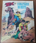 Gibi Raro: Tex Nº 163  O Solitário do Oeste (1983)  Editora Vecchi (Penúltimo Número!)Esta edição é considerada uma verdadeira "joia da coroa" para os colecionadores de Tex no Brasil. Trata-se do penúltimo número publicado pela Editora Vecchi antes de decretar falência definitiva (o título foi cancelado na histórica edição seguinte, de número 164). Devido à crise financeira da empresa na época, a tiragem deste volume foi drasticamente reduzida e sua distribuição nas bancas foi muito precária. Conseguir um exemplar remanescente dessa fase final da Vecchi impresso em papel jornal há mais de 40 anos é uma tarefa extremamente difícil, tornando este lote altamente atraente para quem deseja fechar a coleção