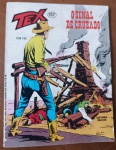 Gibi Raro: Tex Nº 157  O Sinal de Cruzado (1983)  Editora Vecchi (1ª Edição)Nesta empolgante aventura, Tex Willer depara-se com um cenário de destruição e precisa usar toda a sua astúcia e senso de justiça para desvendar uma trama brutal no Velho Oeste. Este volume faz parte da cobiçada reta final de publicações da Editora Vecchi (que encerrou suas atividades no número 164). Devido à severa crise que a empresa enfrentava em 1983, a tiragem desses números foi muito reduzida e sua distribuição foi irregular, tornando os exemplares remanescentes altamente escassos e muito disputados por colecionadores que buscam fechar a primeira cronologia de Tex