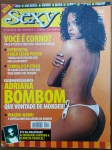 Revista Sexy Nº 297 (Setembro 2004)  Adriana Bombom  100% CompletaAdriana Bombom  Grande ensaio fotográfico de destaque sob o título "Desembrulhamos Adriana Bombom  Que vontade de morder!"