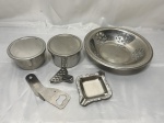 Lote de 2 potes, pãozeira, abridor de garrafa, espremedor de limão e cinzeiro em inox. Medindo a pãozeira 22cm x 3,5cm de altura.