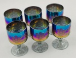 Seis taças para licor em cristal iridescente lapidado com flores. Medindo: 6 x 4 Cm. 