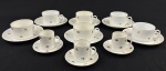 Renner. Nove xícaras em porcelana nacional, esmaltada na cor branca, delicada decoração floral. Sendo 6 para chá e 3 para café. Apresentam desgastes. Uma de chá com batida seca.