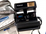 Vintage Coleção, Decoração, Kit Polaroid Câmera Fotográfica 1990`s, modelo 636 Instantânea; Bolsa Térmica, Manual e caixa lacrada de filmes virgens, originais, já com data de vencimento de validade.  Leves marcas de uso. 