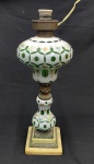 Abajur em cristal overley opalina verde , comumente de origem da Bohemia), decorado com lapidação manual e ornamento florais pintados à mão e base trabalhada. Medindo: 50 x 16 cm.