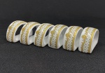 Inglaterra. Seis suportes para talheres em porcelana branca, esmaltado, rica decoração com brasão real britanico.Medindo: 3,5 x 5 cm. 