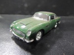 MINIATURA - ASTON MARTIN DB5. MEDE APROX. 12CM. - USADO NO ESTADO CONFORME FOTOS - ITEM SERA ENVIADO DO RS.