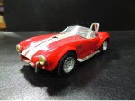 MINIATURA - SHELBY COBRA 427. COM ABERTURA DAS PORTAS. APROX. 12,5CM. - USADO NO ESTADO CONFORME FOTOS - ITEM SERA ENVIADO DO RS.