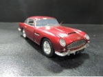 MINIATURA - ASTON MARTIN DB5 1963. COM ABERTURA DAS PORTAS. APROX. 12,5CM. - USADO NO ESTADO CONFORME FOTOS - ITEM SERA ENVIADO DO RS.