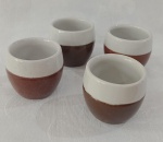 Lote com quatro pequenos copos para shot . Medindo : 5x5 cm .