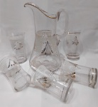 Belissima Jarra em vidro para agua/suco , com decoração de arabesco, filetagem dourada . Acompanha Cinco copos . Med jarra : 25x16cm / Copo : 12 cm.