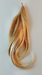 Pequeno aplique/rabo para cabelo, no tom louro mel com mechas . Med aprox 40 cm de comprimento .