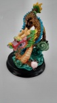 Art Oriental estatua representando dragão chines , multicoloridos . Medida : 10 x 7 cm.