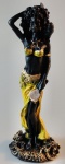 Escultura em resina representando o orixá OXUM, todo patinado à ouro e na cor negra. Medindo 22 cm de altura.