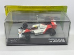 Miniatura Formula 1 Senna Mclaren MP4/4 San Marino GP 1988, escala 1:43. Item no estado conforme fotos. Carrinho de Coleção.