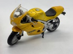 Miniatura Maisto Motocicleta Triumph 955i Daytona, com suspensão flexível. Item no estado conforme fotos. Carrinho de Coleção.