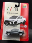 Miniatura Fiat Strada, escala 1/64, pneus de borracha, lacrado. Carrinho de coleção, item no estado conforme fotos.