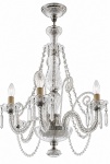 LUSTRE EM CRISTAL  Elegante lustre de 6 braços curvos, profusa decoração com pingentes e prismas em cristal lapidado, de efeito translúcido e sofisticado. Perdas do tempo. No estado.Medidas: 80 x 60 cm