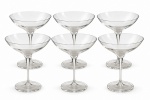 Conjunto com 6 taças para coquetel, em cristal translúcido, de formato coupe, com bojo amplo, haste esguia e bases circulares. Elegante conjunto para mesa posta. Mede 19 cm de altura x 14 cm de diâmetro.