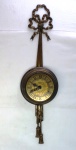 BRASEIKO VINTAGE- Relógio  para parede estrutura em bronze, mostrador em metal, funcionamento a quartzo. Peça icônica de Design Déc 50. Funcionndo. Med. 70 x 18 cm diâmetro.