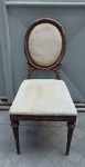 LEANDRO MARTINS - Antiga cadeira medalhão, confeccionadas em madeira nobre no estilo francês (madeira esta com base para preparação de folha de ouro), encosto necessita fixação,  com estofamento em chenile no tom bege. Vendida no estado. Med.: 97 x 43 x 45