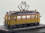 Miniatura ferroviária die-cast do elétrico Ce 2/3 "Valutawagen" (Lindner/SLM/SSW, 1920/1934) da Birseckbahn (BEB). Apresenta pintura em tons de amarelo e castanho com letreiros laterais "BIRSECKBAHN  seit 1902 für Sie unterwegs!", inscrições "NICHTRAUCHER" e monogramas da BEB, teto detalhado com pantógrafo central e placas frontais de destino "BEB", interior visível com bancos, plataforma e base expositora com placa identificativa inscrita "Ce 2/3 Valutawagen (Lindner/SLM/SSW) - 1920 (1934)". Medidas: 07 x 12 x 03 cm. Com marcas de tempo de uso.