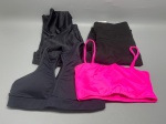 Lote composto por quatro peças de vestuário feminino para atividade física: um top esportivo preto com alça estilo nadador (racerback) e abertura frontal em V, com faixa elástica na base; um shorts preto em tecido canelado com textura; uma calça legging preta com etiqueta aparente; e um top cropped na cor rosa pink com alças finas. Peças confeccionadas em tecido sintético com elastano aparente. Marca e tamanhos não identificados nas imagens. Estado de conservação aparente: usado. conjunto esportivo, indumentária esportiva, roupa de treino, activewear, sportswear, top nadador, bermuda fitness, calça fuseau