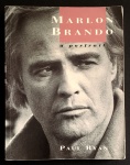livro - Marlon Brando: a portrait - Paul Ryan - Plexus - 1991 - 1º ed. - idioma inglês - 192 p. - brochura com marcas do tempo - miolo em bom estado de conservação - dedicatórias na folha de rosto - (24X19) cm.