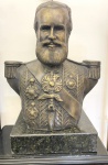 ZANI Fundição Artística - Escultura em bronze patinado representando "D. PEDRO II", base em ônix, peça marcada e com selo da fundição. Med. total 70 X 55 cm.