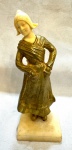 Escultura em bronze com Marfim representando Dama, base em mármore. Med. total 16 cm.
