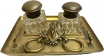 Antigo Tinteiro em metal decorado com figura de cavalo e recipientes em cristal (marcas do tempo). Med. 13 X 28 X 20 cm.