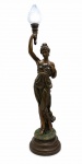 Grande e Vistosa Escultura/Luminária em Petit Bronze patinado representando Figura Feminina com Tocha. Med. Total. 175 cm.