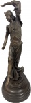 Escultura em petit bronze patinado representando "Dançarina". Med. 55 cm.
