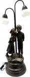 Belíssima Escultura/Luminária em petit bronze patinado representando "Casal", funcionando. Med. 62 X 34 cm.