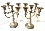 Par de Antigos Candelabros para 5 Velas em metal espessurado a prata. Med. 31 X 27 cm.