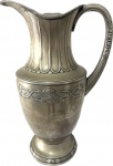 WMF - Germany - Circa 1900 - Grande e Antigo Jarro Art Nouveau em metal espessurado a prata, decorado com figuras florais em alto relevo, peça marcada embaixo. Med. 44 X 26 cm.