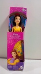 Boneca Disney Princesas - Bela em Roupa de Festa Mattel na embalagem