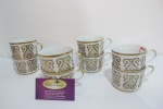 8 xícaras de chá em  porcelana europeia , decorada com ouro