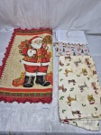 NATAL - Lote de caminho de mesa e 2 panos de prato, motivos natalinos. Medindo 100cm x 48cm. Contém marcas de uso.