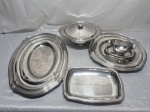 TRAMONTINA - Baixela com 8 peças em aço Inox. Medindo a sopeira 24cm x 9cm de altura.