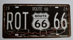 Placa Decorativa "ROUT 66" com efeito envelhecido confeccionada em metal. Medidas: 31x16 cm.