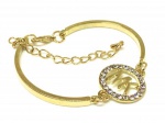 Elegante bracelete ao gosto MICHAEL KORS tipo algema em aço inoxidável banhado a ouro e cravejado em cristais, novo e sem uso. Maravilhoso!