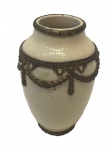 SEVRES- vaso de porcelana com guarnições em metal dourado medindo 8 cm alt. Marcada na base.