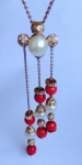 H STERN - Excepcional colar feminino, de ouro 18k, contraste 750, corrente dupla, com pingente também contrastado, cravejado por apliques de ouro cravejados por brilhantes, pérolas e coral.