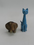 Lote com 2 peças, 1 gato de porcelana - 25 cm de alt, 7 de larg, 8 de prof e 1 elefante em porcelana - 15 cm de alt, 13 de larg, 16 de prof.