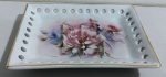 Porta Coisas em formato quadrado em porcelana com motivos florais . Mede: 15 x 11 cm 