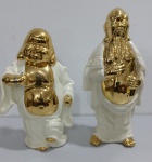 Novos Par de BUDAS em porcelana resinada com detalhes em ouro . Mede: 36 e 32 cm