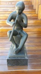 BRUNO GIORGI - "Flautista", excecional escultura em bronze cinzelado e patinado, assinada. Med.: 70x38 cm.