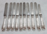 THOMAS KRUPP - 10 antigas facas para jantar, início do séc. XX, feitos  em alpaca espessurada a prata. Med. 23 cm